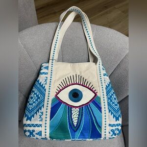 America & Beyond Wanderlust Evil Eye Tote hand-beaded design & jacquard fabric